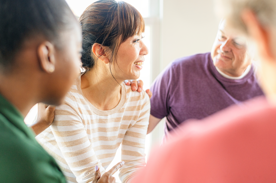 people offering support to one another in a support group