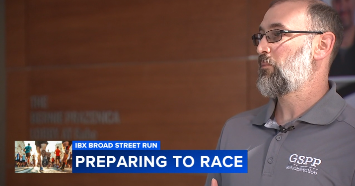A screenshot of a television segment on 6abc Action News with the chyron saying "Preparing to Race" and GSPP Rehabilitation's Rich DiGiacomo talking, sharing tips for stretching